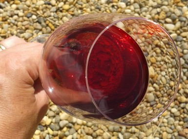 The transulcent cherry/garnet color of our cheery wine.