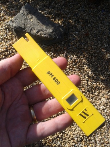 A simple hand held pH meter.