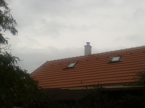 New tiles installed just in time before the rain. New tiles installed just in time before the rain.