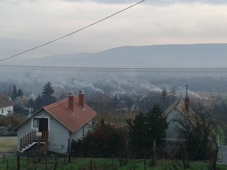 Chimney smoke on a cold day. img_914956023