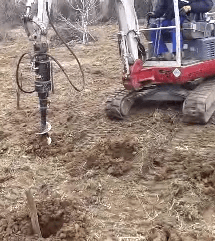 Drilling to plant new vines.