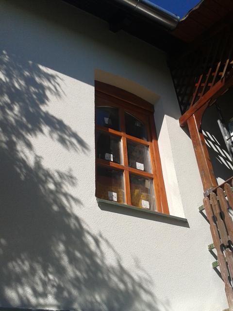 The new window as installed with final plaster applied to the walls.