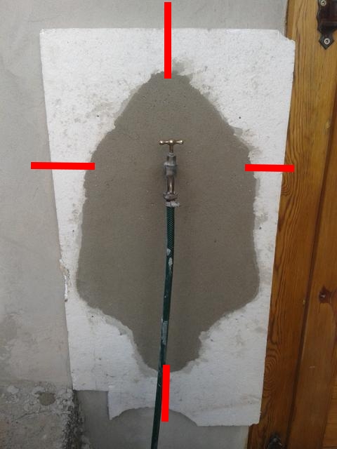 Cutting lines to remove the mold for the raised backing for the garden faucet basin.