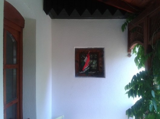 Small window on our front porch with a bird nest. Can you see it?