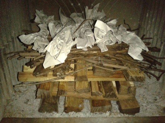 Place paper strips above twigs.