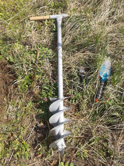 A few supplies and tools needed to replant a wine vine.