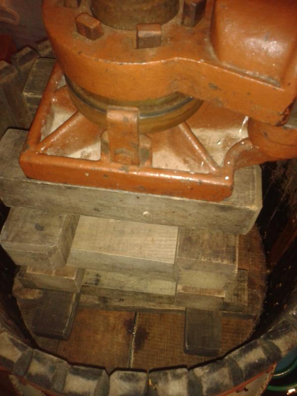 Stacking wooden extensions in the press.